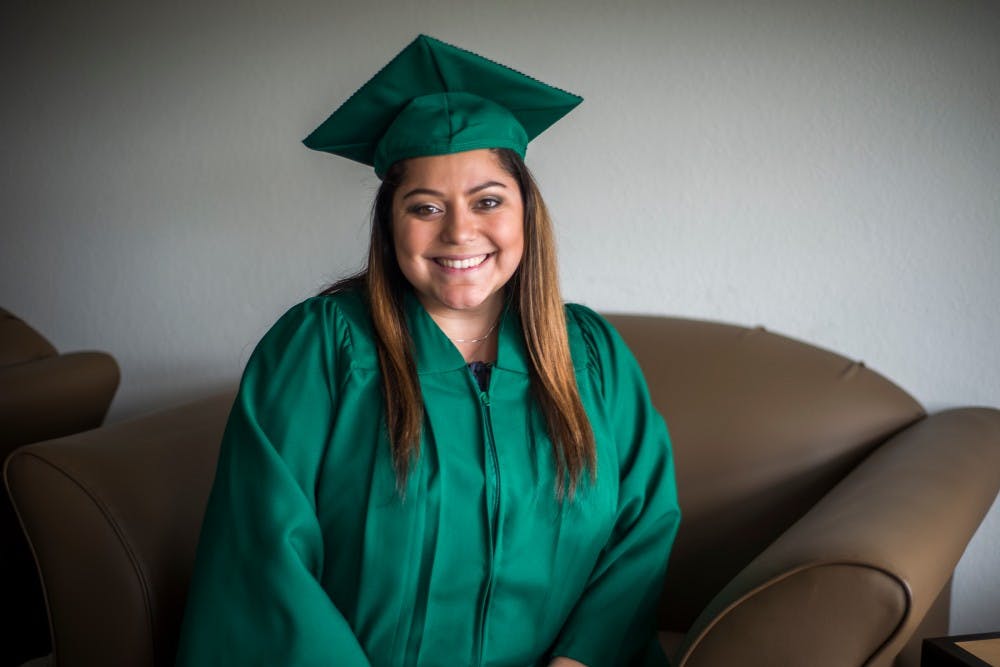<p>Advertising senior Raquel Izzo poses for a photo on April 26, 2017 at Campus Village Apartments at 1151 East Michigan Ave in East Lansing. Izzo will be graduating with the rest of her class on May 5.</p>