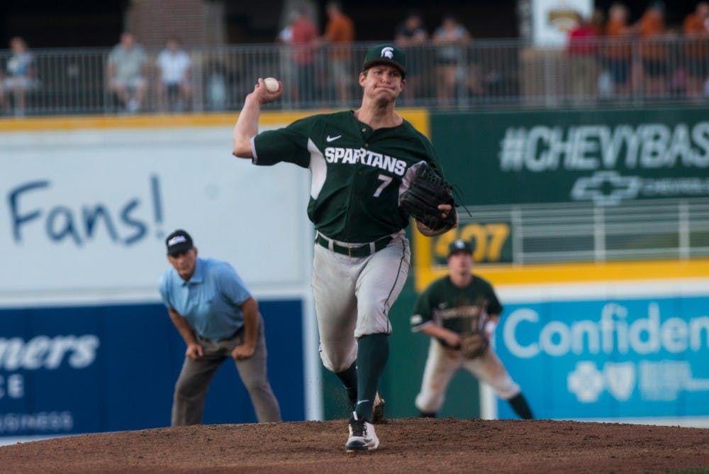 Junior right hand pitch Ethan Landon throws the ball during the first inning of the game against the Lansing Lugnuts  on Sept. 6, 2016 at Lugnuts Stadium. The Spartans were defeated by the Lugnuts, 4-1. 