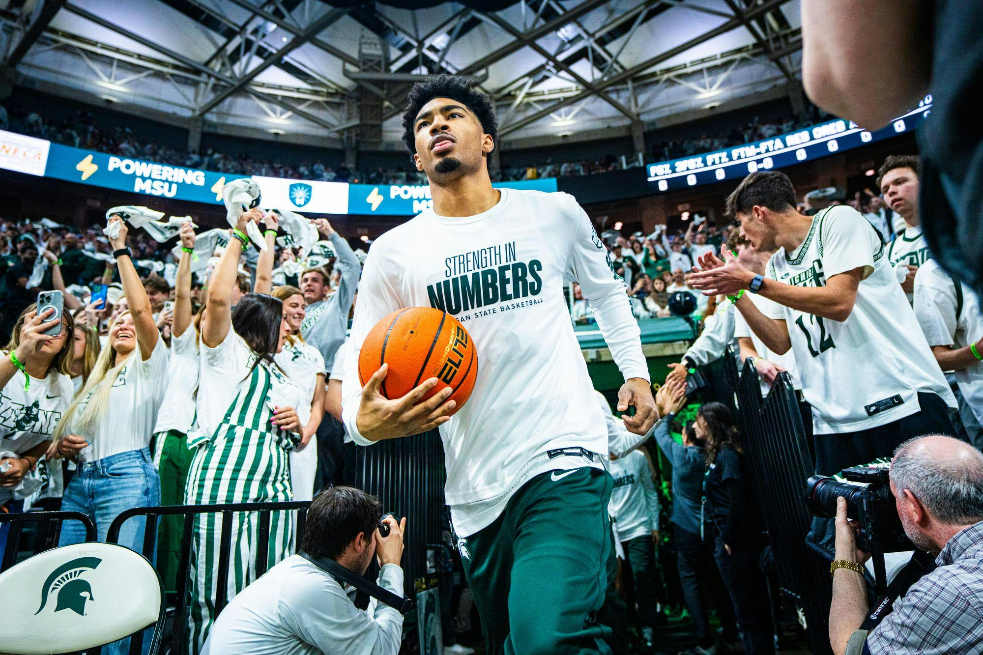 <p>Michigan State senior guard Jaden Akins (3) runs out of the tunnel moments before a game at the Breslin Center on March 9, 2025.</p>