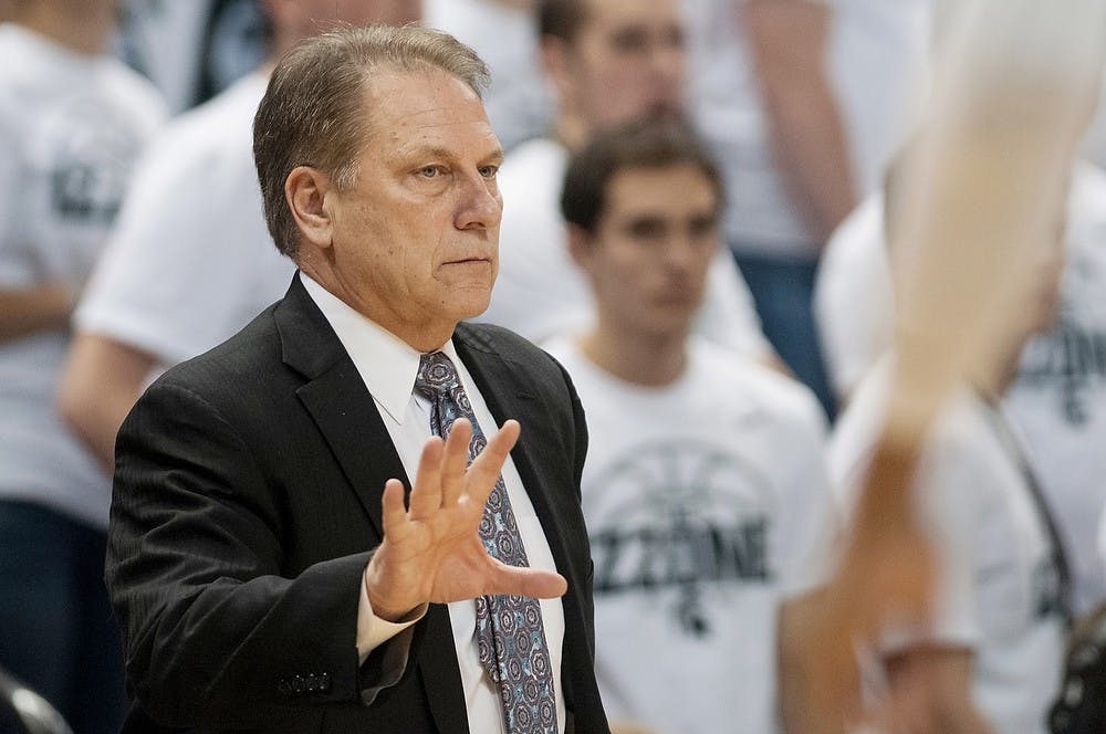 	<p>Head coach Tom Izzo gestures to players during the game against Portland on Nov. 18, 2013, at Breslin Center. The Spartans defeated the Pilots, 82-67. Danyelle Morrow/The State News</p>