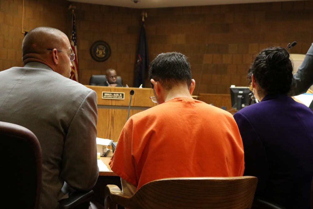 Judge Donald Allen Jr looks at Larry Nassar during the final day of the preliminary examination hearing in the 55th District Court on June 23.