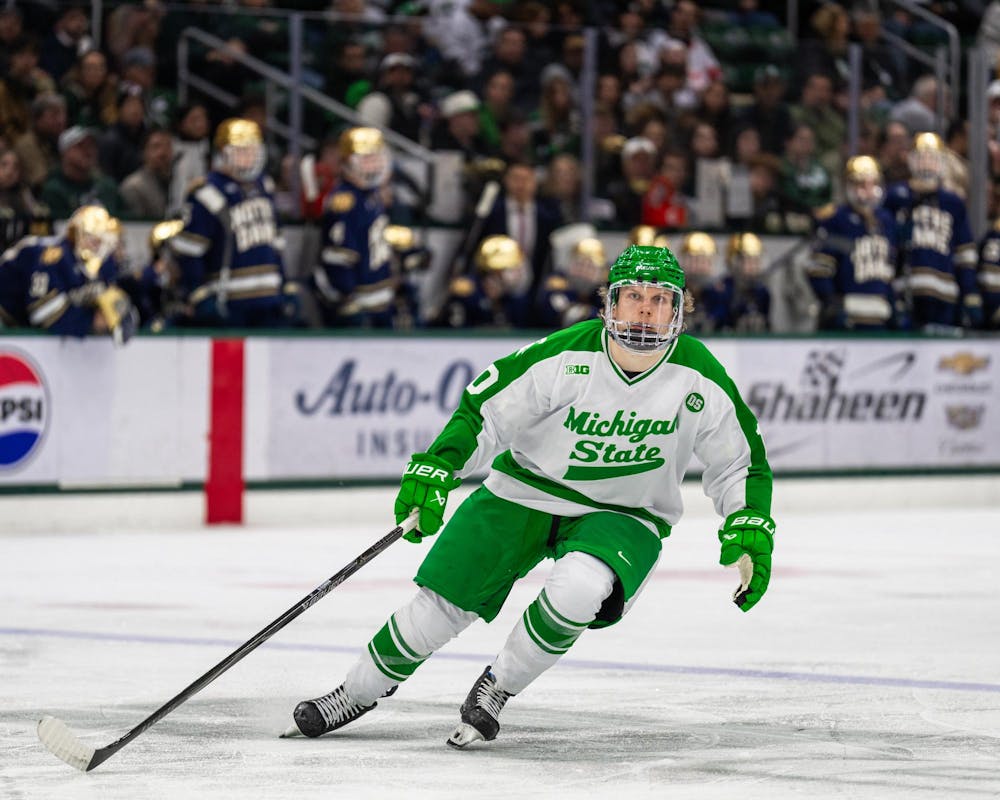 MSU Jr. F, Tommi Männistö (10), stares down his opponent with the puck in Munn Ice Arena in East Lansing, MI on Feb. 19, 2026.