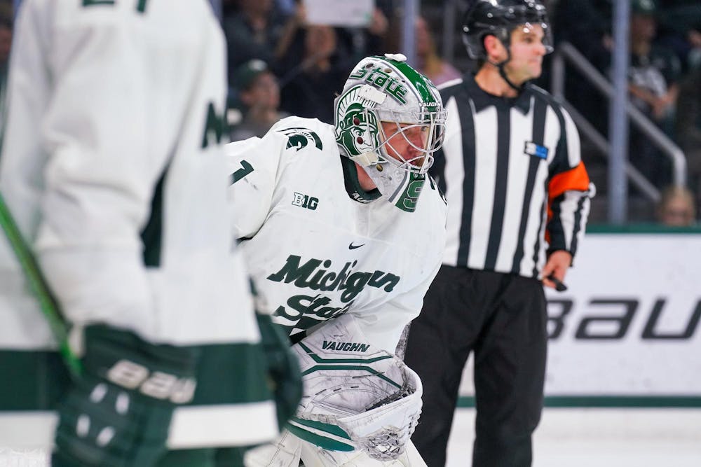 <p>Freshman goalie Trey Augustine (1) looking focused during a game against Penn State at the Munn Ice Arena on Nov. 10, 2023. Augustine would end the game with 37 saves.</p>