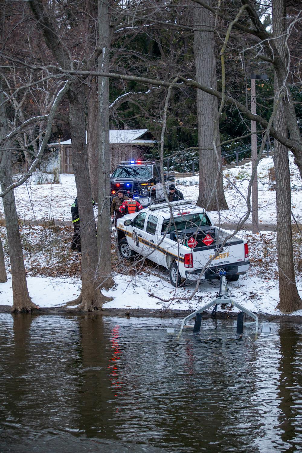 <p>A truck pulls a boat out of the water in the latest search for missing 18-year-old Brendan Santo. Shot on Dec. 9, 2021.</p>