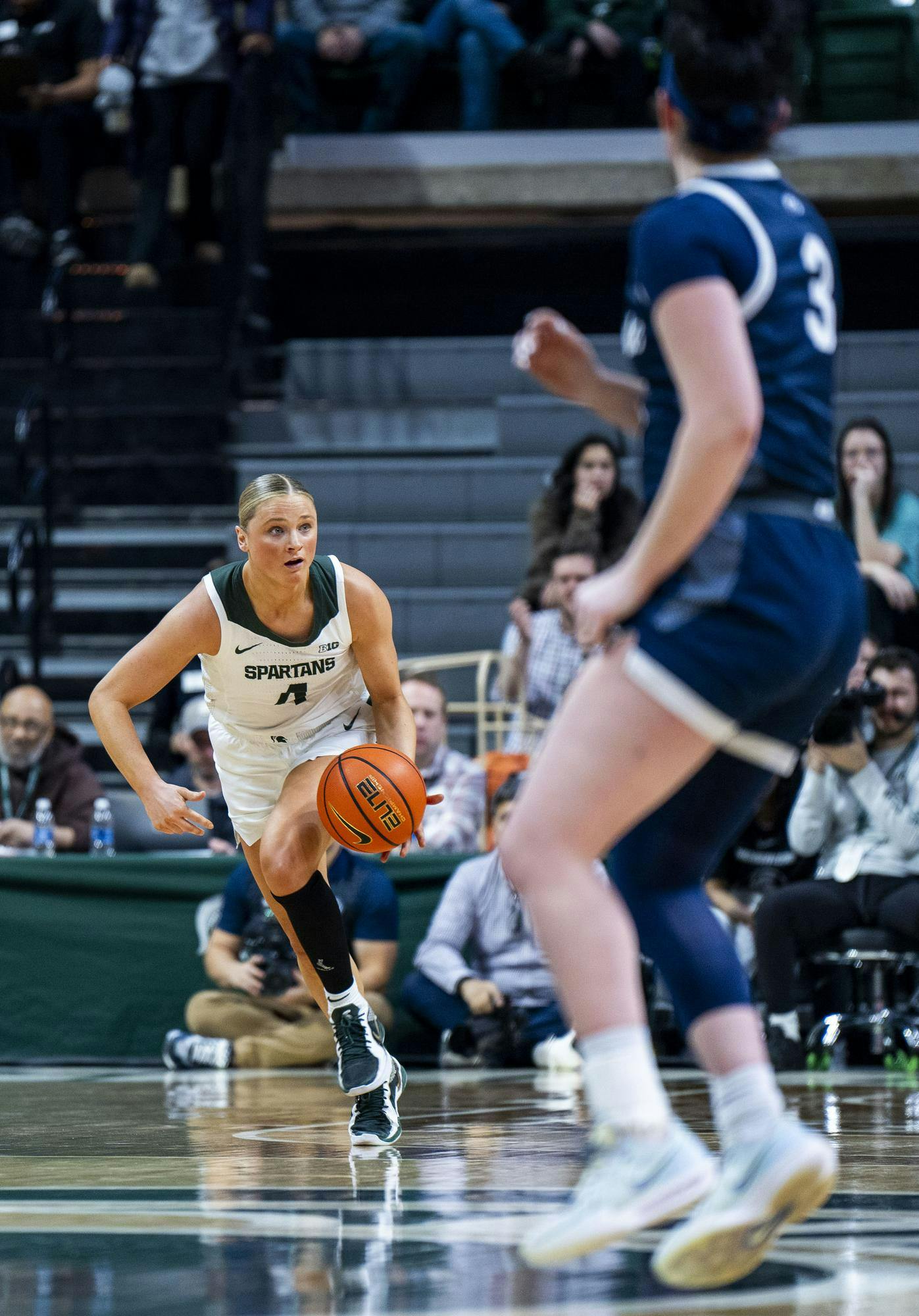 <p>Michigan State junior guard Theryn Hallock (4) dribbles the ball across the court while Penn State redshirt sophomore guard Moriah Murray (3) watches at the Breslin Center on Jan. 22, 2025. The Spartans defeated the Nittany Lions 82-61.</p>