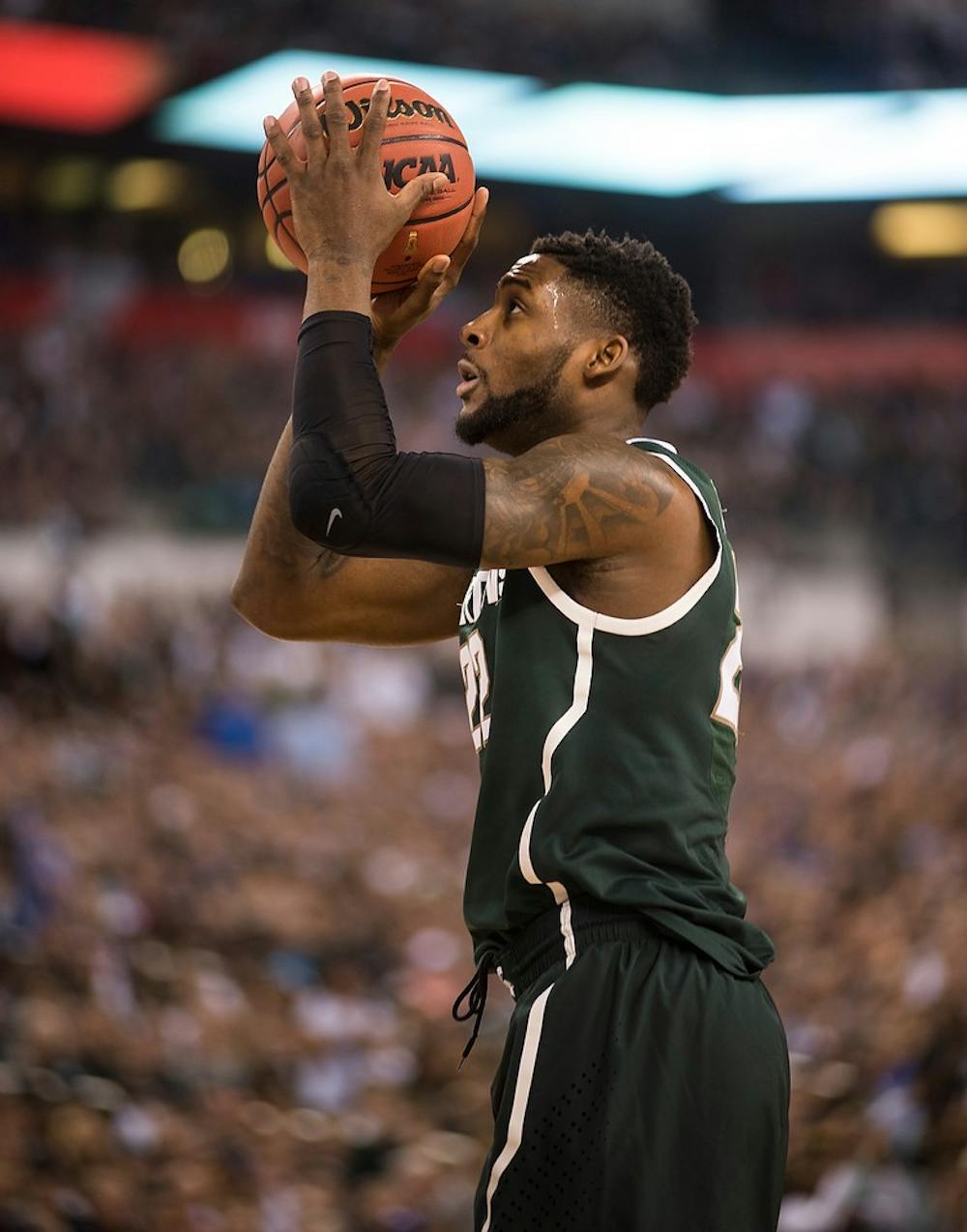 <p>Senior forward Branden Dawson attempts a basket April 4, 2015, during the semi-final game of the NCAA Tournament in the Final Four round at Lucas Oil Stadium in Indianapolis, Indiana. The Spartans were defeated by the Blue Devils, 81-61. Erin Hampton/The State News</p>