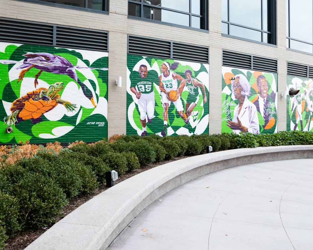 <p>A new public art mural was painted at Graduate East Lansing hotel by a Detroit-based artist named Jacob Dwyer. </p>