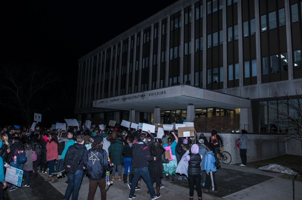 Protestors reach their final destination, the Hannah Administration building during the March for Survivors and Change on Jan. 26, 2018, at the Hannah Administration building on Michigan State University's campus. (C.J. Weiss | The State News)