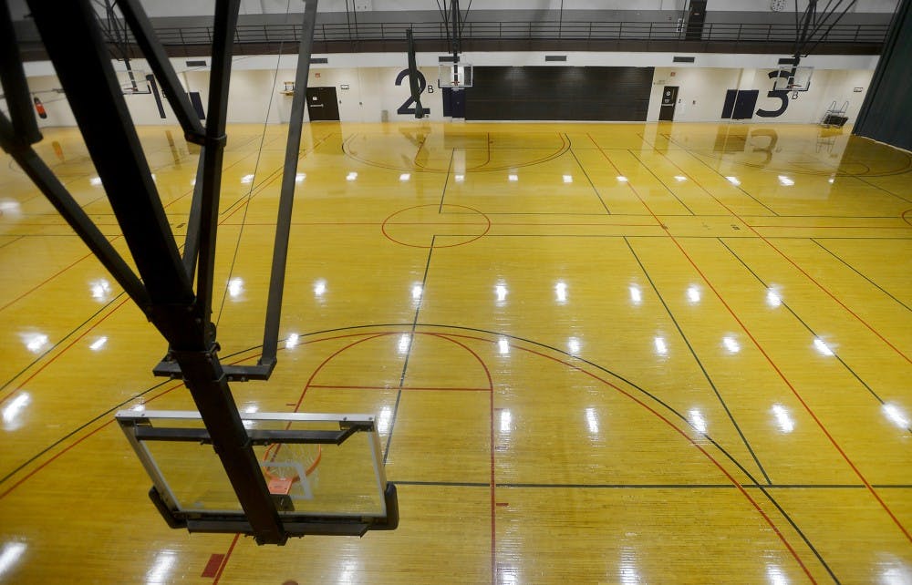 <p>A view from above of the main gym on Oct. 16, 2015, at the North Campus Recreation Building on 2375 Hubbard Road in Ann Arbor. This facility was completed in 1976 and will undergo a renovation beginning in 2020. </p>