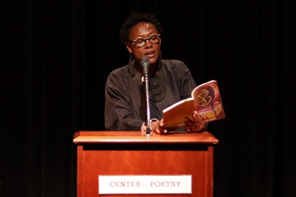 <p>Michigan poet laureate Nandi Comer reads a poem from her book "Tapping Out" in the RCAH Theater on Oct. 19, 2023.</p>