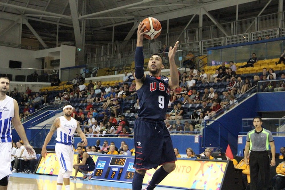 <p>Denzel Valentine attempts a layup in USA's 102-70 win over Puerto Rico. Photo courtesy of USA Basketball.</p>