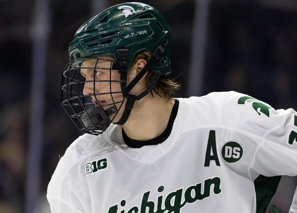 <p>MSU Sr. F, Charlie Stramel (15), looks to his teammates, displaying a new DS badge to represent Dan Sturges, in Munn Ice Arena in East Lansing, MI on Jan. 23, 2026.</p>
