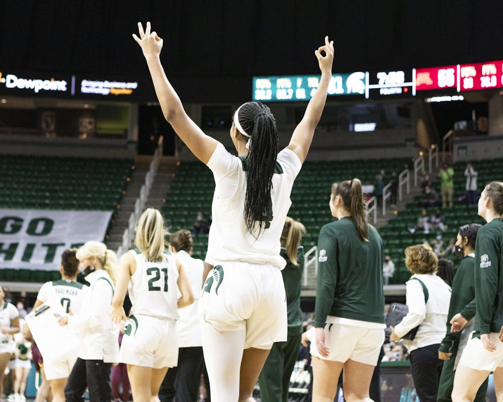 <p>The Michigan State University women’s basketball team celebrates as they have taken a lead over Minnesota, and the game is inching to a close on Jan. 23, 2022.</p>