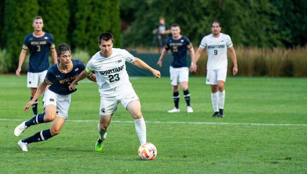 <p>Spartan graduate student midfielder Louis Sala kicks the ball away from his Notre Dame opponent on August 29th, 2022.</p>