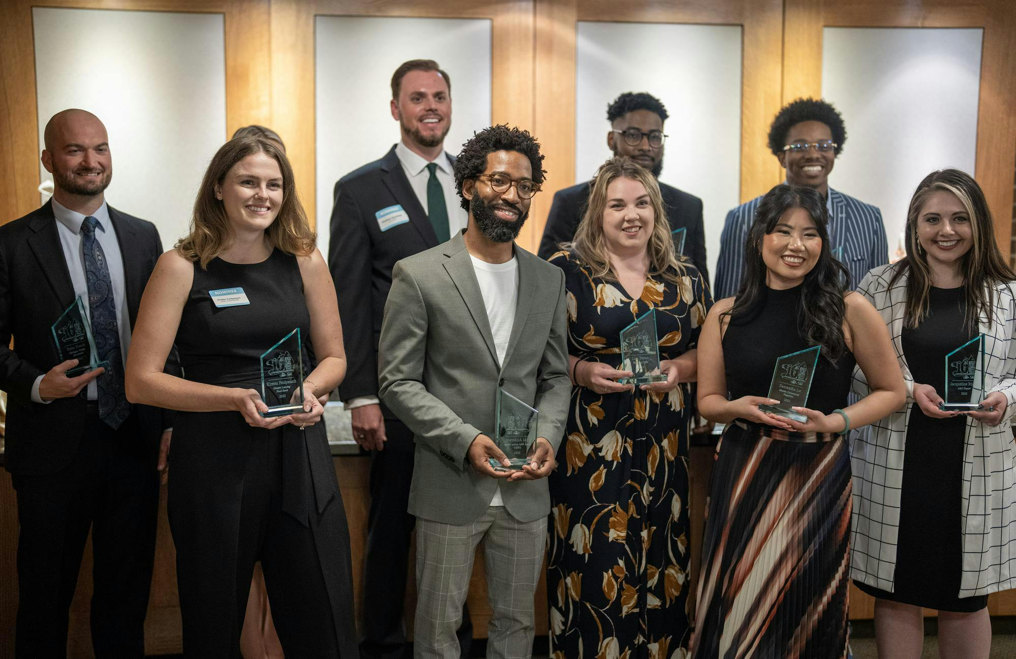 <p>Recipients of the Lansing Chamber of Commerce 10 for the next 10 award pose with at the University Club on Sep. 19, 2023</p>