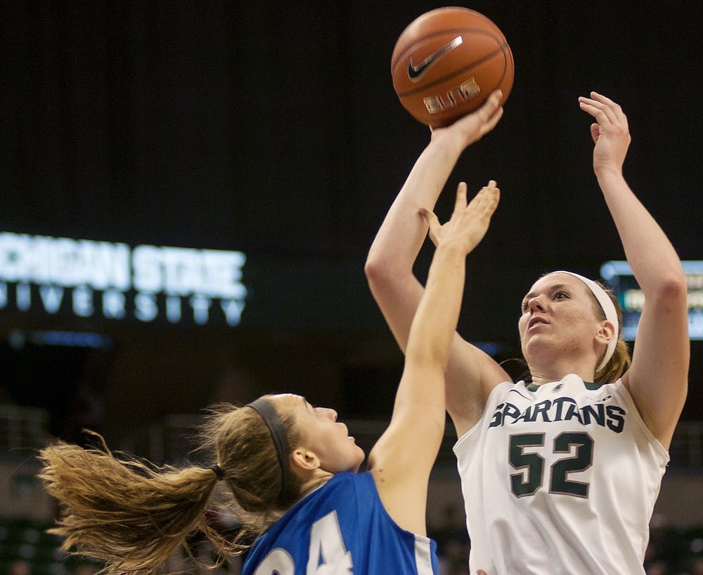 	<p>Junior forward Becca Mills shoots the ball over <span class="caps">IPFW</span> forward Rebecca Bruner on Dec. 1, 2013, at Breslin Center. <span class="caps">MSU</span> lost to <span class="caps">IPFW</span>, 81-74. Margaux Forster/The State News</p>