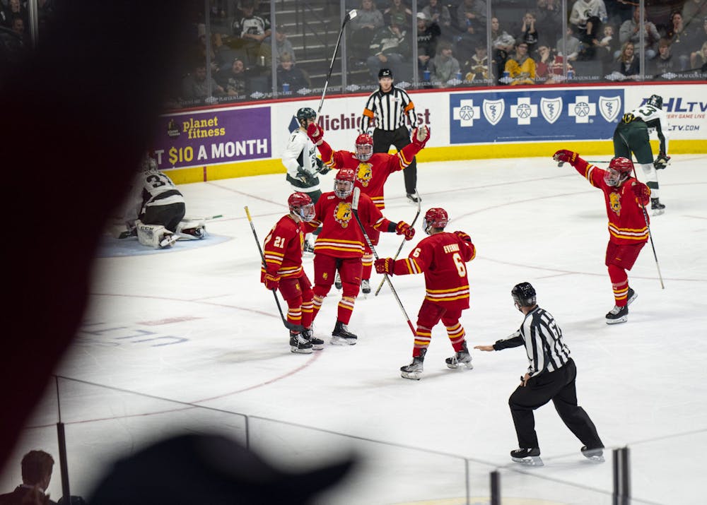 Ferris State celebrates a goal over Michigan State during their semifinal matchup in the Great Lakes Invitational on Dec. 27, 2022 at Van Andel Arena in Grand Rapids.