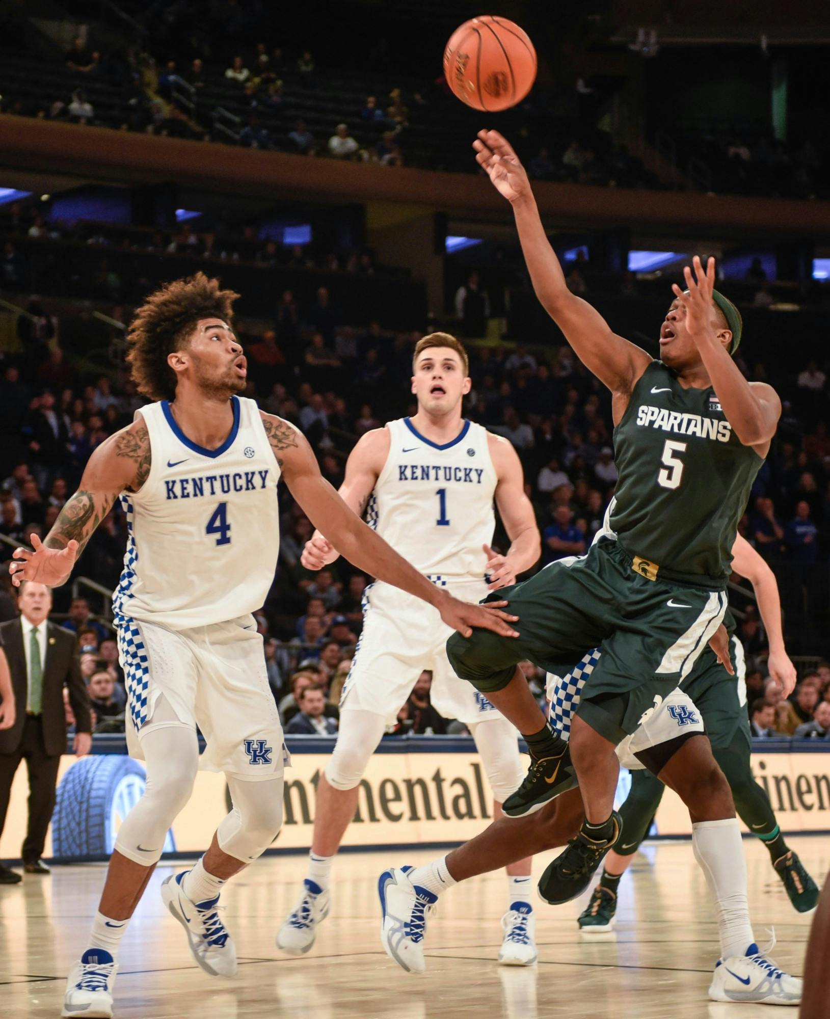 Senior guard Cassius Winston (5) shoots the ball during the game against Kentucky at the State Farm Champions Classic at Madison Square Garden on Nov. 5, 2019. The Spartans fell to the Wildcats, 69-62.