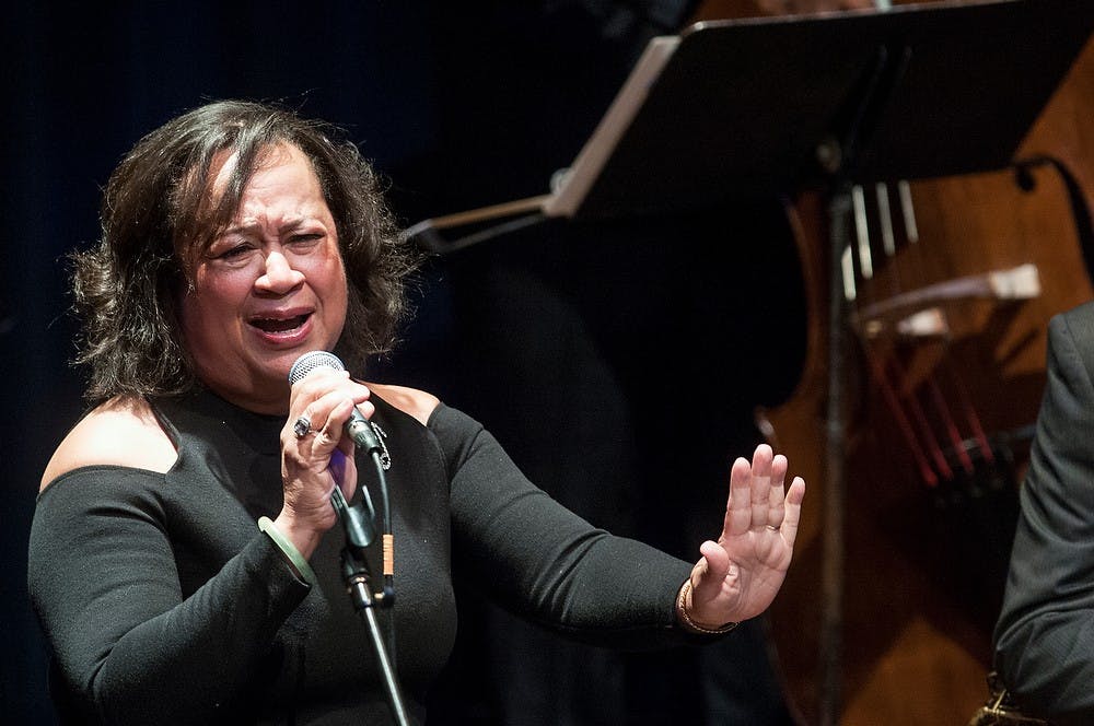 	<p>Guest vocalist Mardra Thomas sings during the <span class="caps">MSU</span> Professors of Jazz concert Aug. 28, 2013 at the Pasant Theatre. The professors dedicated the performance to the 50th anniversary of the March on Washington. Katie Stiefel/The State News</p>