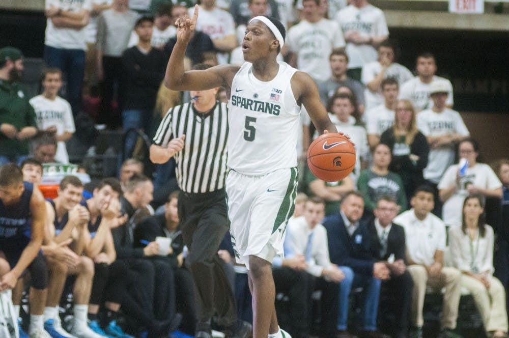 Freshman guard Cassius Winston (5) dribbles down the court during the basketball game against Northwood on Oct. 27, 2016 at Breslin Center. The Spartans defeated the Timberwolves, 93-69. 