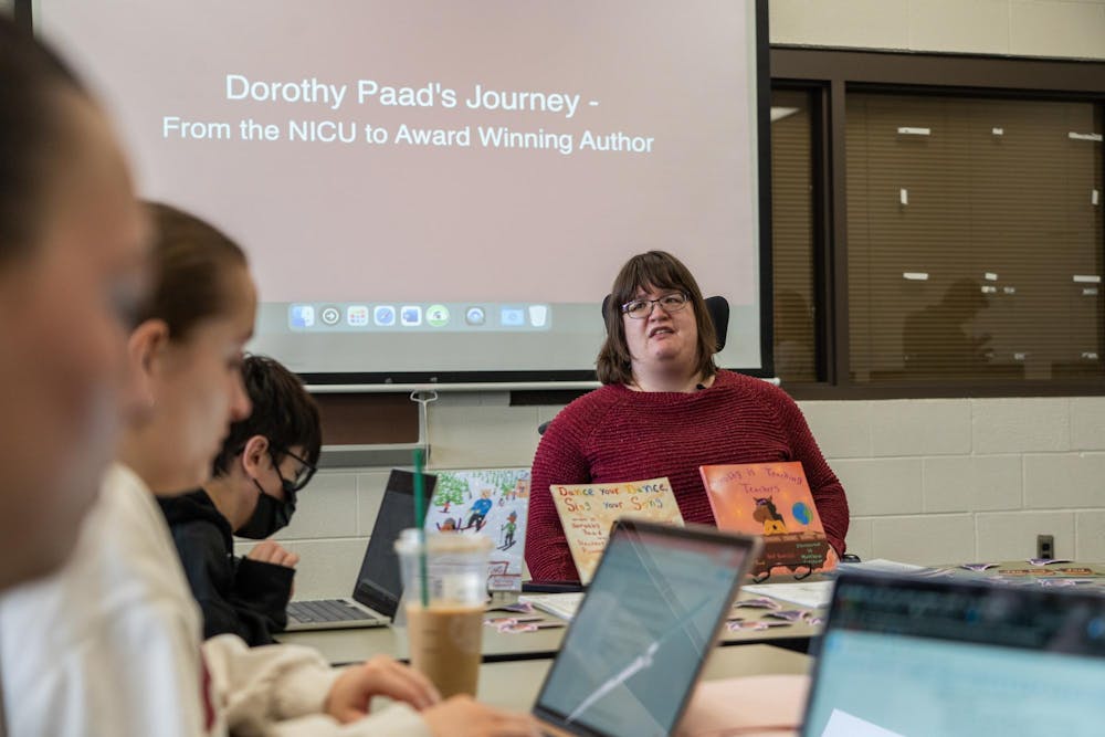 <p>Author Dorothy Paad speaks to a journalism class at Michigan State University on Wednesday, March 20, 2024. Paad has written several children's books about her experience with cerebral palsy and how she's overcome challenges throughout her life.</p>