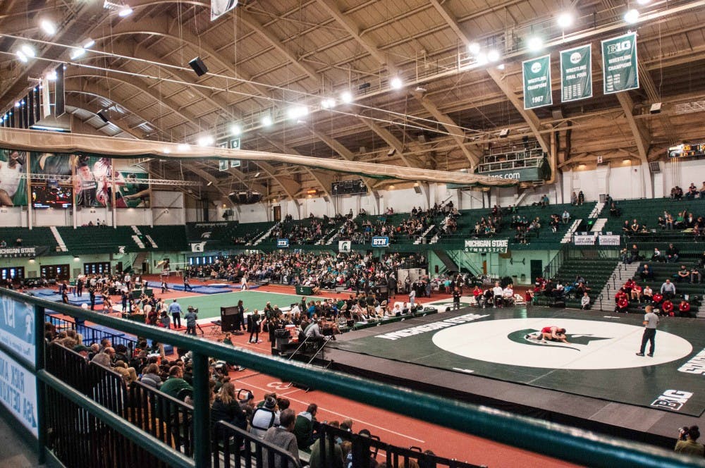 An aerial view of the Tumbles and Takedowns event on Feb. 4, 2018, at Jenison Fieldhouse. The Spartans fell to the Huskers, 35-6.(Annie Barker | State News)