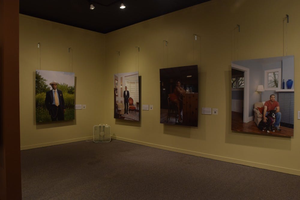 Artwork from the exhibit Taking Back Detroit is displayed on Sept. 1, 2016 at the MSU Museum.