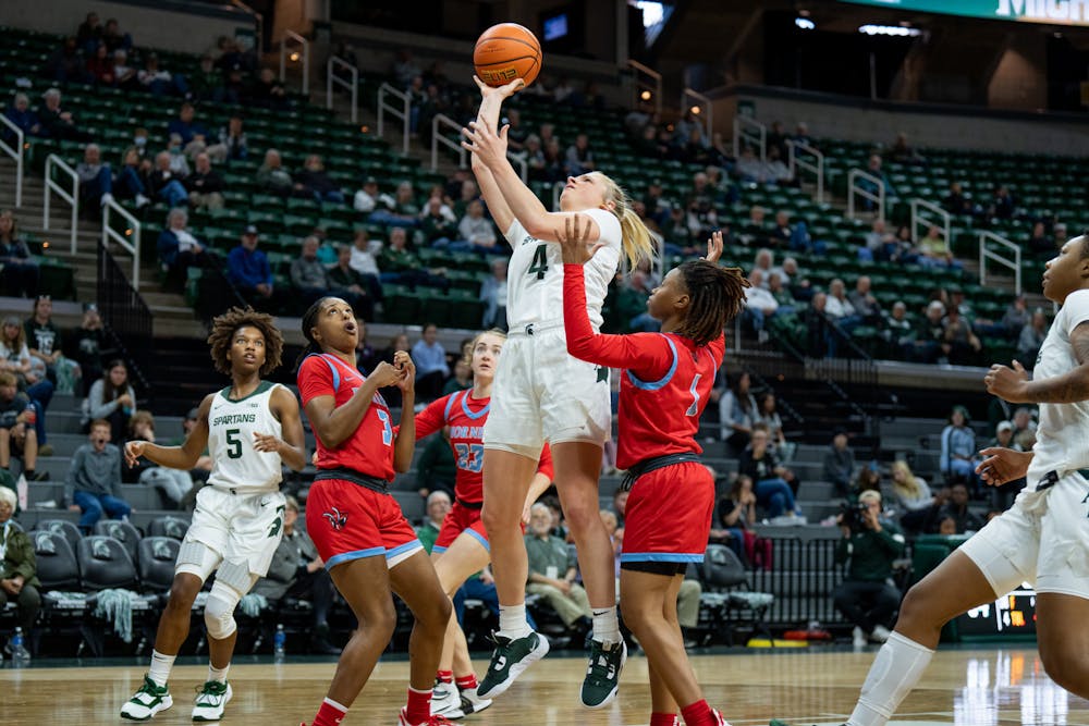 <p>Freshman guard Theryn Hallock goes up for a layup during the Spartans&#x27; 86-37 win over Delaware State on Nov. 7.</p>