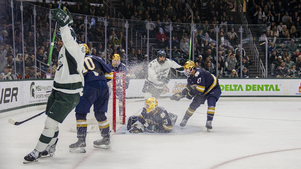 <p>MSU senior defenseman David Gucciardi (7) scores against Notre Dame at Munn Ice Arena on Nov. 15, 2024. Michigan State takes the win 8-3. </p>
