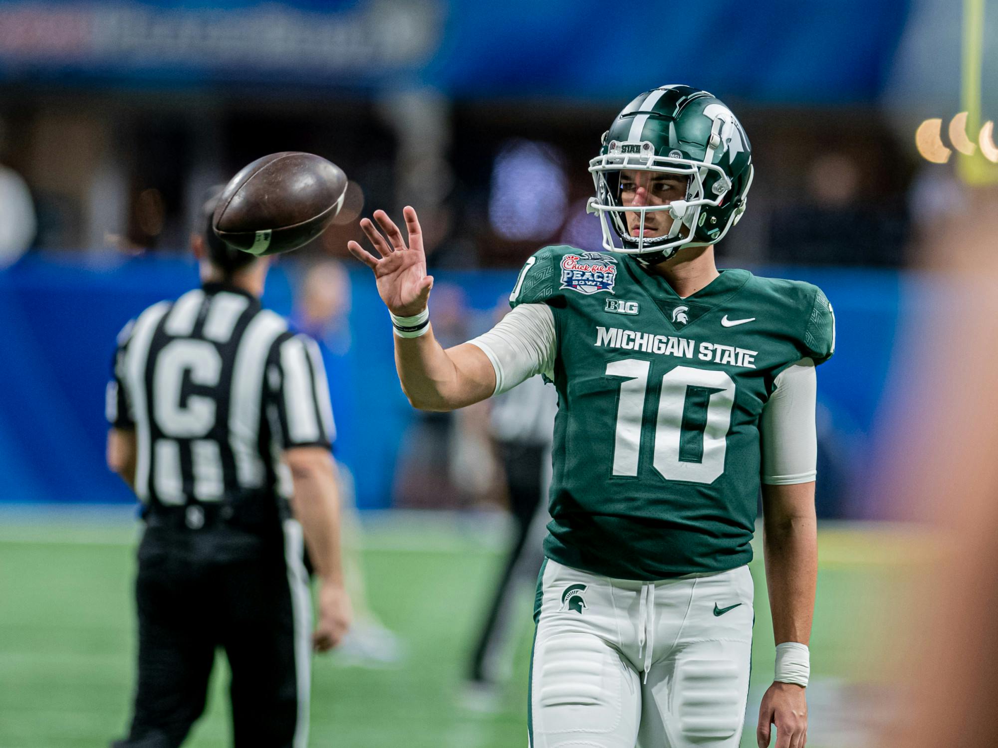 <p>Then-redshirt sophomore quarterback Payton Thorne catches a ball in warmups before the Peach Bowl on Dec. 30, 2021.</p>