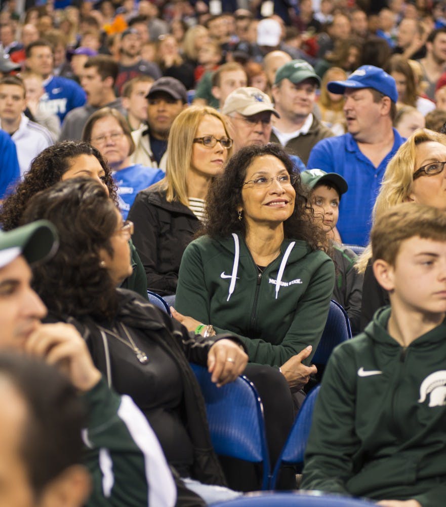 <p>Lupe Izzo watches the team play April 3, 2015, during the practice at NCAA tournament in the final four round at Lucas Oil Stadium in Indianapolis, Indiana. Spartans practice in preparation for their game against Duke University. Hannah Levy/The State News.</p>