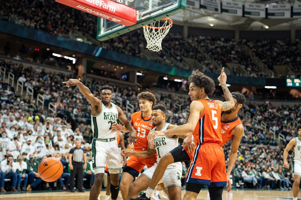 <p>The Spartans and Illini argue as the balls lands out of bounds at the Breslin on Feb. 29, 2022.</p>