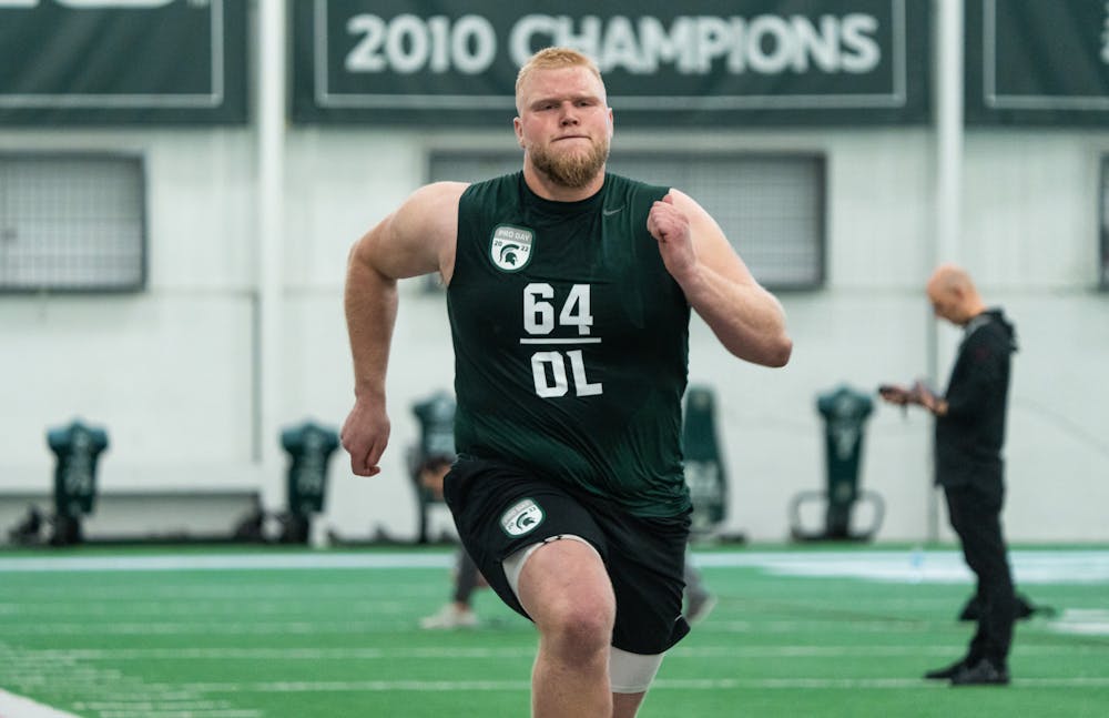 <p>Michigan State graduate student Matt Allen giving it everything he has during the 40 yard dash, on Mar. 16, 2022 at the Duffy Daugherty Indoor Football Building.</p>