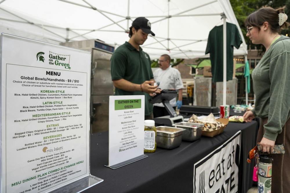 <p>Eat at State hosts a pop-up tent serving people food in the MSU Union courtyard in East Lansing, Mich., on Wednesday, Sept. 16, 2026.</p>