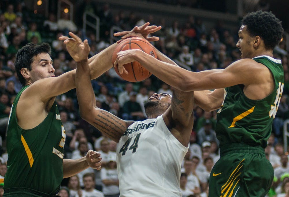 Junior forward Nick Ward (44) misses a shot during the game against Northern Michigan at Breslin Center on Oct. 30, 2018. The Spartans defeated the Wildcats, 93-47.