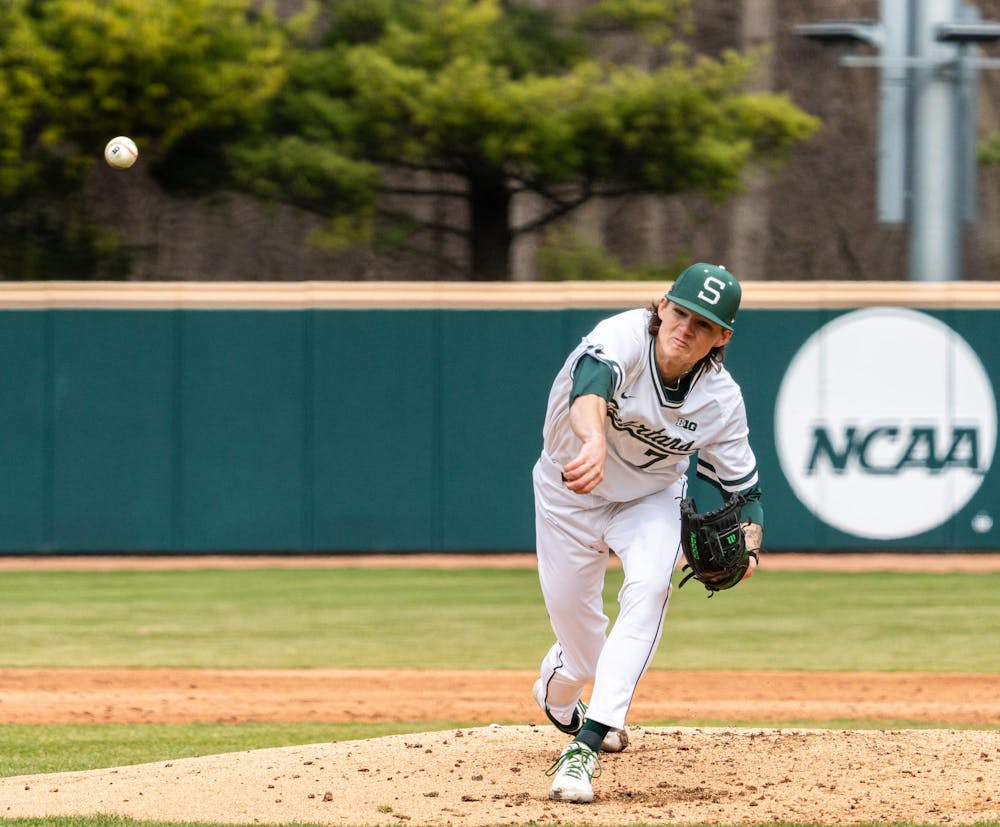MSU Gr. RHP, Carter Monke (7), throws a pitch towards home plate in game 2 of their series with Iowa in the Jeff Ishbia Field in McLane Stadium in East Lansing, MI on March 21, 2026.