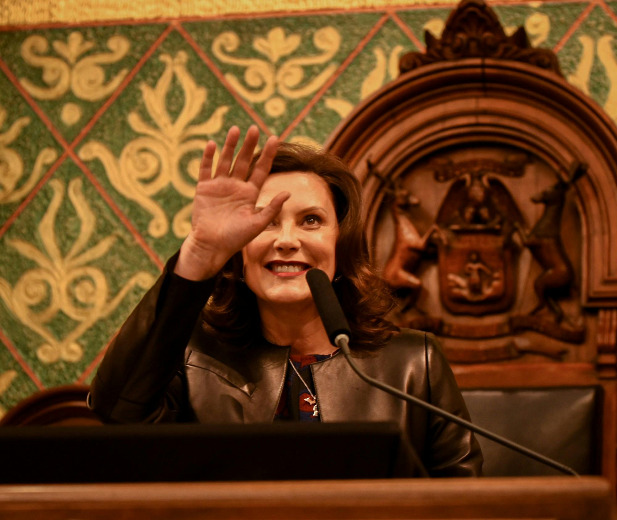 <p>Michigan Gov. Gretchen Whitmer waves to the crowd during her second State of the State address at the Michigan State Capitol in Lansing on Jan. 29, 2020.</p>