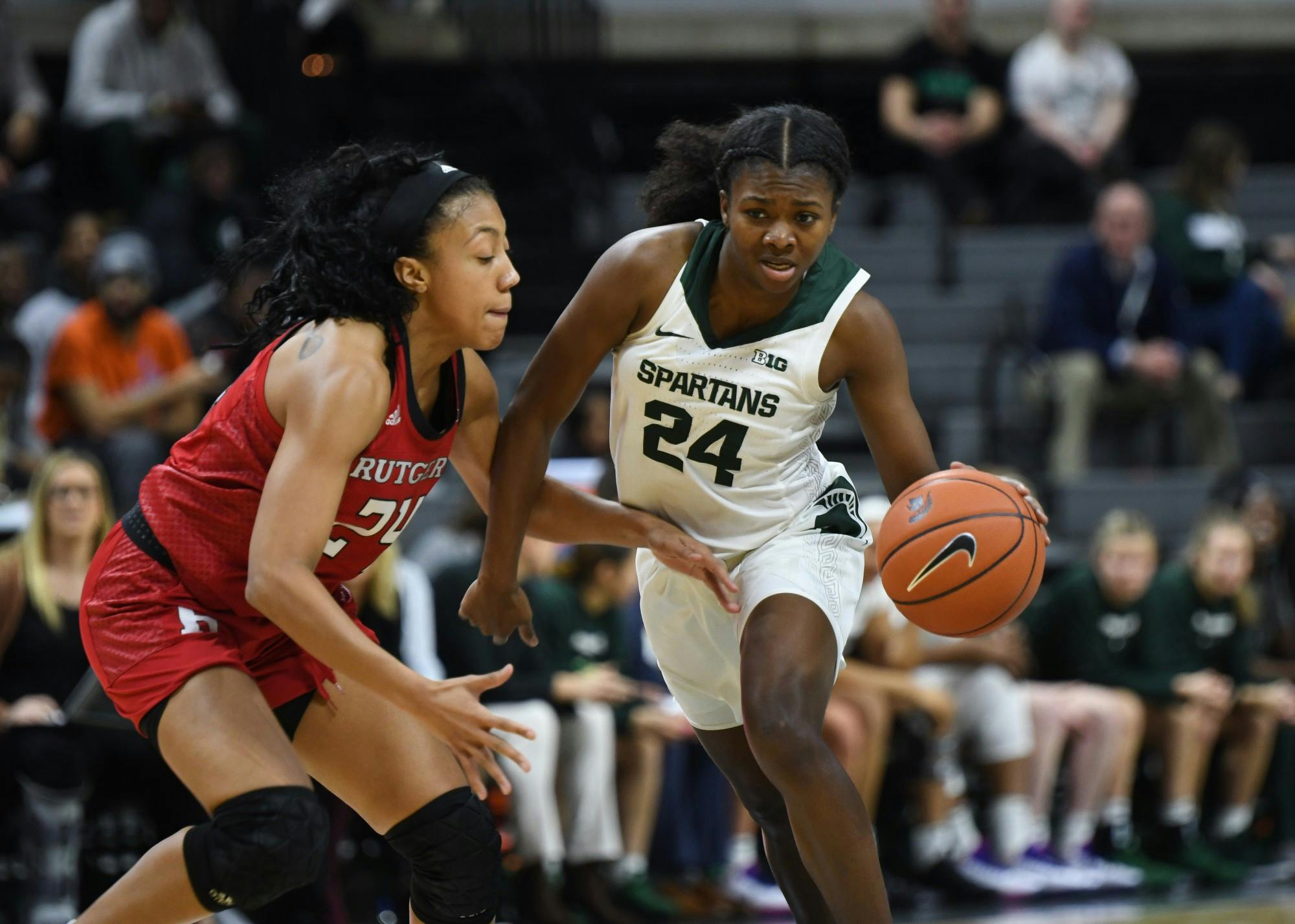 <p>Then-sophomore guard Nia Clouden (24) pushes past a defender during the women&#x27;s basketball game against Rutgers at the Breslin Center on Feb. 13, 2020.</p>