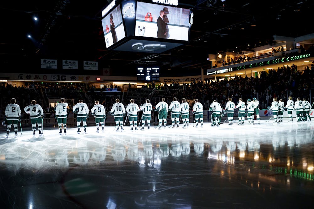 <p>Michigan State men&#x27;s hockey team lined up before the national anthem before their game against Notre Dame on Feb. 19, 2022.</p>