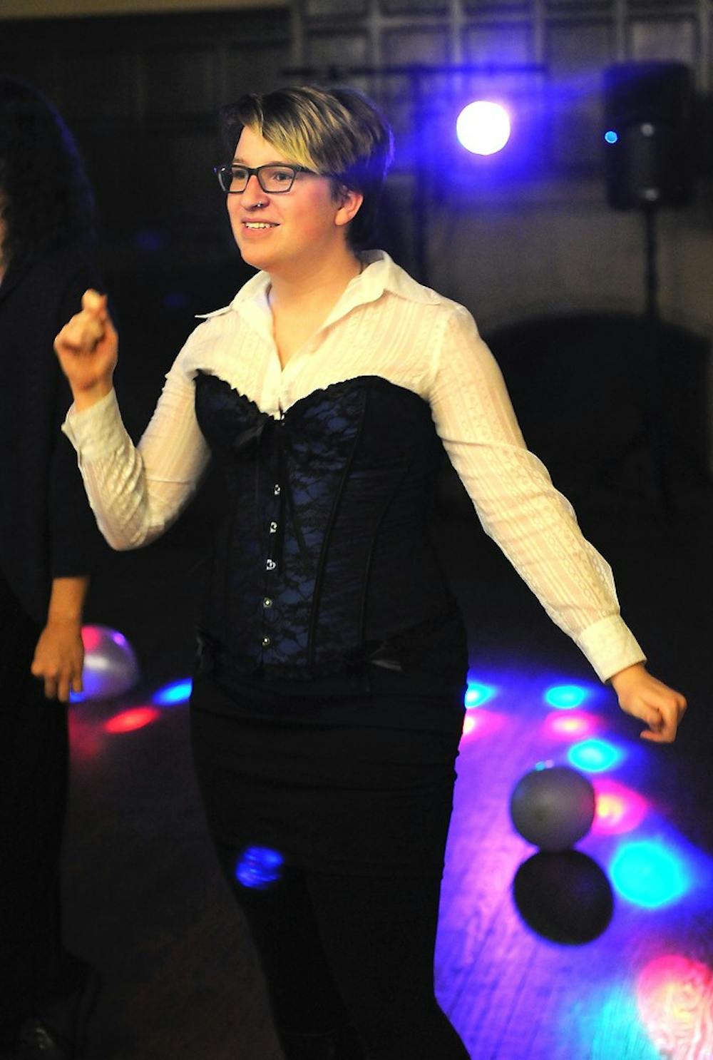 <p>Zoology sophomore Ray Preuss dances April 24, 2015, during Pride Prom, held at Williams Great Hall, 25 Beal St. The event was held for members of the LGBT+ community to enjoy a prom experience without the discrimination found at many proms. Alice Kole/The State News</p>