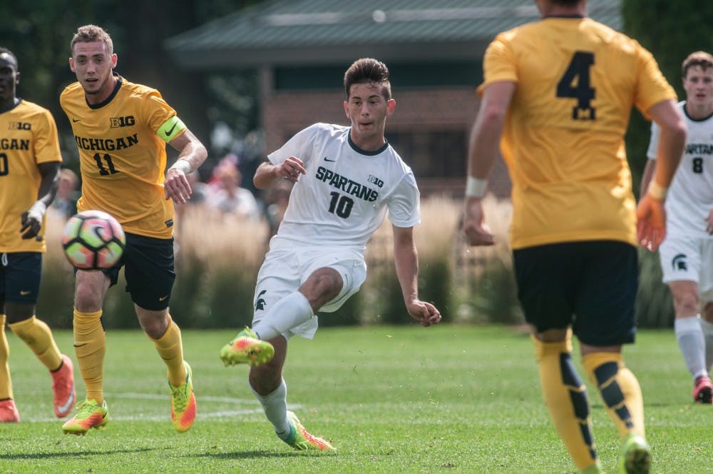 Freshman midfielder Giuseppe Barone (10) passes the ball upfield on Sept. 18, 2016 at DeMartin Stadium at Old College Field. The Spartans defeated the Michigan Wolverines, 1-0. 