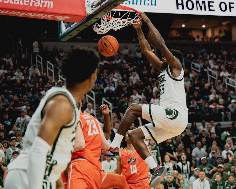 <p>MSU sophomore forward Coen Carr (55) dunks the ball in a game against Bowling Green at the Breslin center on Nov. 16, 2024</p>