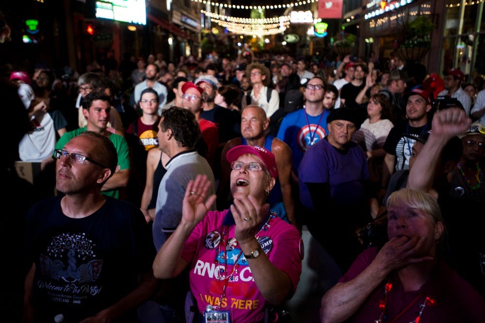 Forth Worth, Texas resident Cheryl Surber cheers while watching republican presidential nominee Donald Trump's speech on July 21, 2016, the fourth day of the Republican National Convention, in Cleveland, Ohio. Surfer said she has been a state delegate for many years and she also loves Donald Trump.