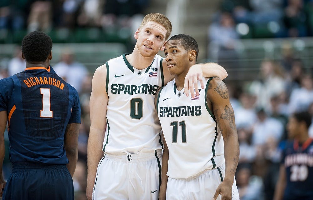 	<p>Sophomore guard Russell Byrd, rests his arm on junior guard Keith Appling in the second half of the game. The Spartans defeated the Fighting Illini,, 80-75, Thursday, Jan. 31, 2013, at Breslin Center. Justin Wan/The State News</p>