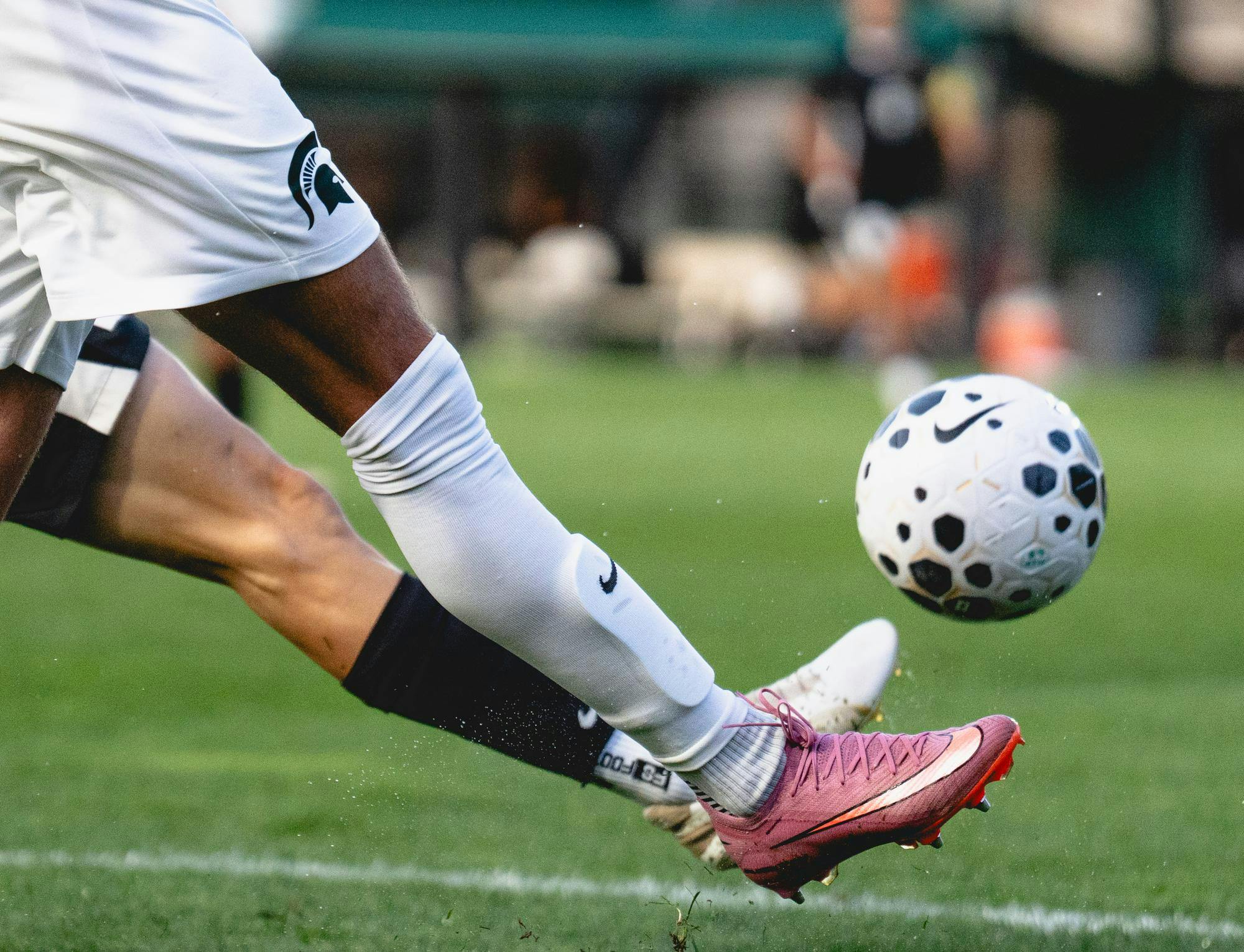 <p>A Michigan State forward and Oakland forward both kick the ball at the DeMartin Soccer Complex in East Lansing, Michigan on Sept 8, 2025.</p>