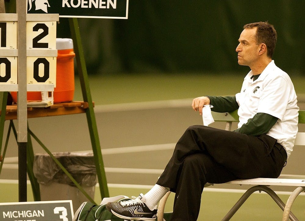 <p>MSU men's tennis head coach Gene Orlando watches a match Feb. 27, 2015, at the MSU Indoor Tennis Facility on 3571 E. Mt. Hope Ave. in Lansing. The Spartans defeated the Penguins, 6-0. Alice Kole/The State News</p>