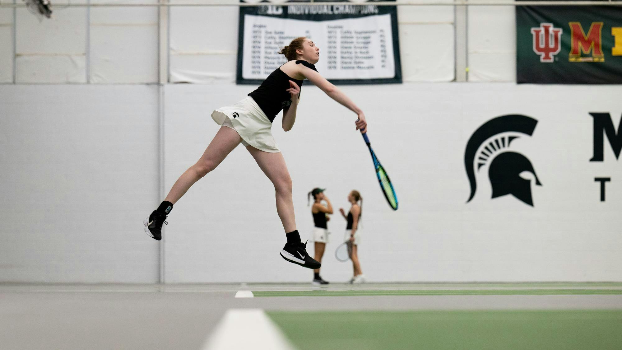 <p>MSU redshirt sophomore Oriana Parkins-Godwin serves during the doubles match at MSU Tennis Center on Jan. 26, 2025.</p>