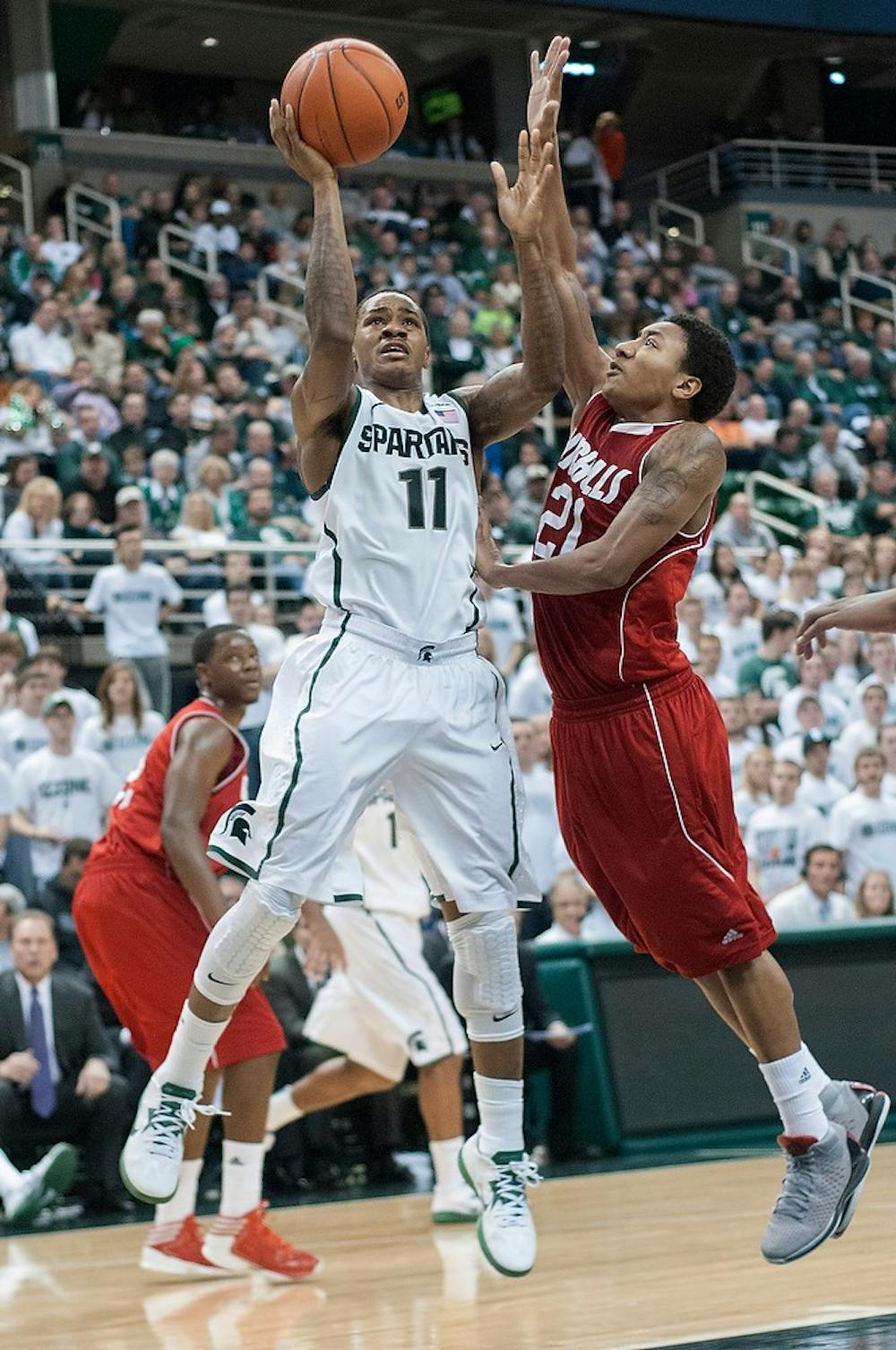 	<p>Junior guard Keith Appling goes up for a shot during the game against Nicholls State on Dec. 1, 2012, at Breslin Center. Appling was the leading scorer for the Spartans with a total of 13 points, helping them beat the Colonels 84-39. Natalie Kolb/The State News</p>
