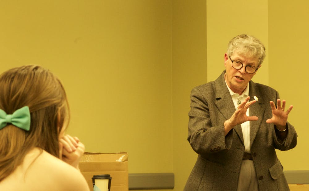 <p>MSU&nbsp;President Lou Anna K. Simon answers a question from ASMSU Women's Council&nbsp;representative Jen Alberts at the Student Services Building on Sept. 7. Photo: Alexea Hankin</p>