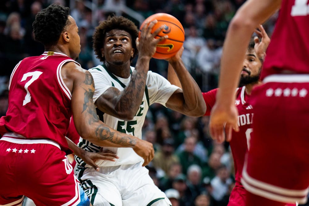 <p>Michigan State Spartans forward Coen Carr (55) goes up for basket during an NCAA Division I basketball game between Michigan State and Indiana at the Breslin Center in East Lansing, Michigan, on Tuesday, Jan. 13, 2026.</p>